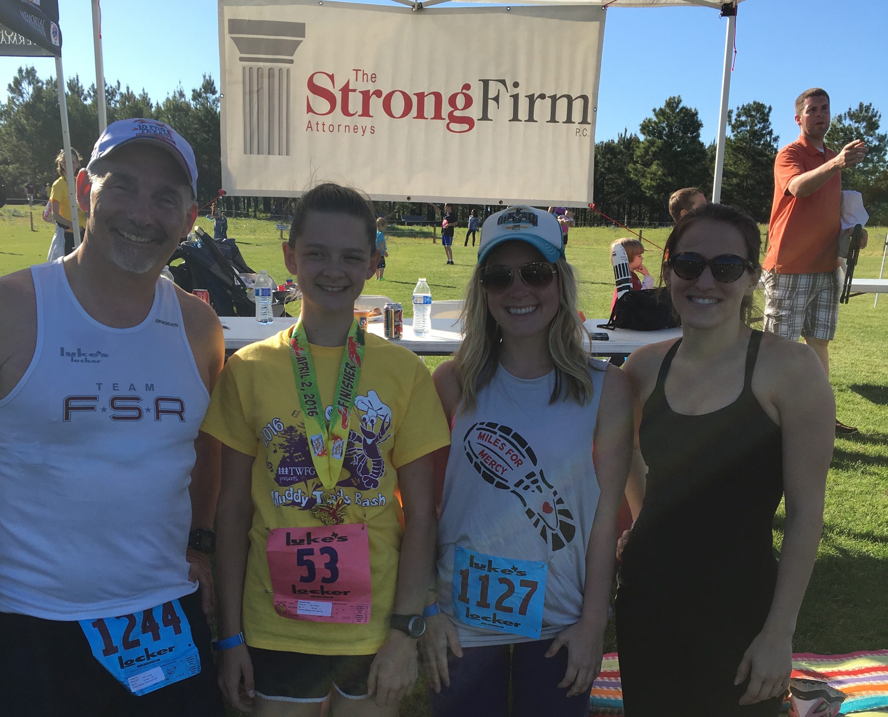 The Strong Firm sponsored and participated in the annual Muddy Trails Bash held at Rob Fleming Park on April 2, 2016. Shown from left to right are Bret Strong, Alexi Caldwell, Bethany Kovacs and Laura Davis.