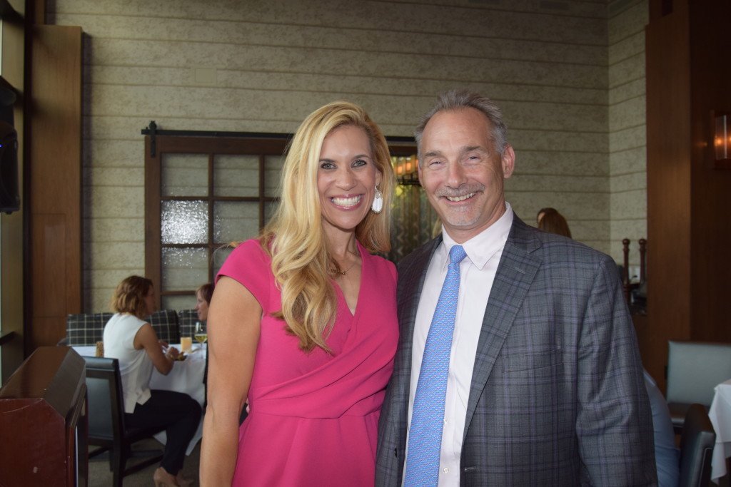 Bret Strong with Missy Herndon, president and CEO of Interfaith of The Woodlands, at the preview reception for Interfaith's new publication "The Book - The Woodlands" for which The Strong Firm was a premier advertiser.