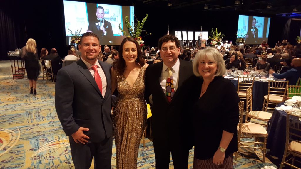 We were proud to be a Music Sponsor at Children's Safe Harbor's Gala this past week where Donoho's Jewellers was also a sponsor. We were able to snag a picture of Bart and Courtney West (co-director of Donahoe's) along with Steve Glazer (co-director of Donahoe's) and Renee Levey Glazer (paralegal at The Strong Firm P.C.).
