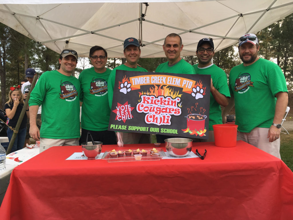 Pictured: John Lambie (husband of Wendy Lambie) as head chef of the chili cook-off team that won 1st place at the Creekside Park Village Chili Cook Off Event on January 14, 2017 where The Strong Firm P.C. was a sponsor.